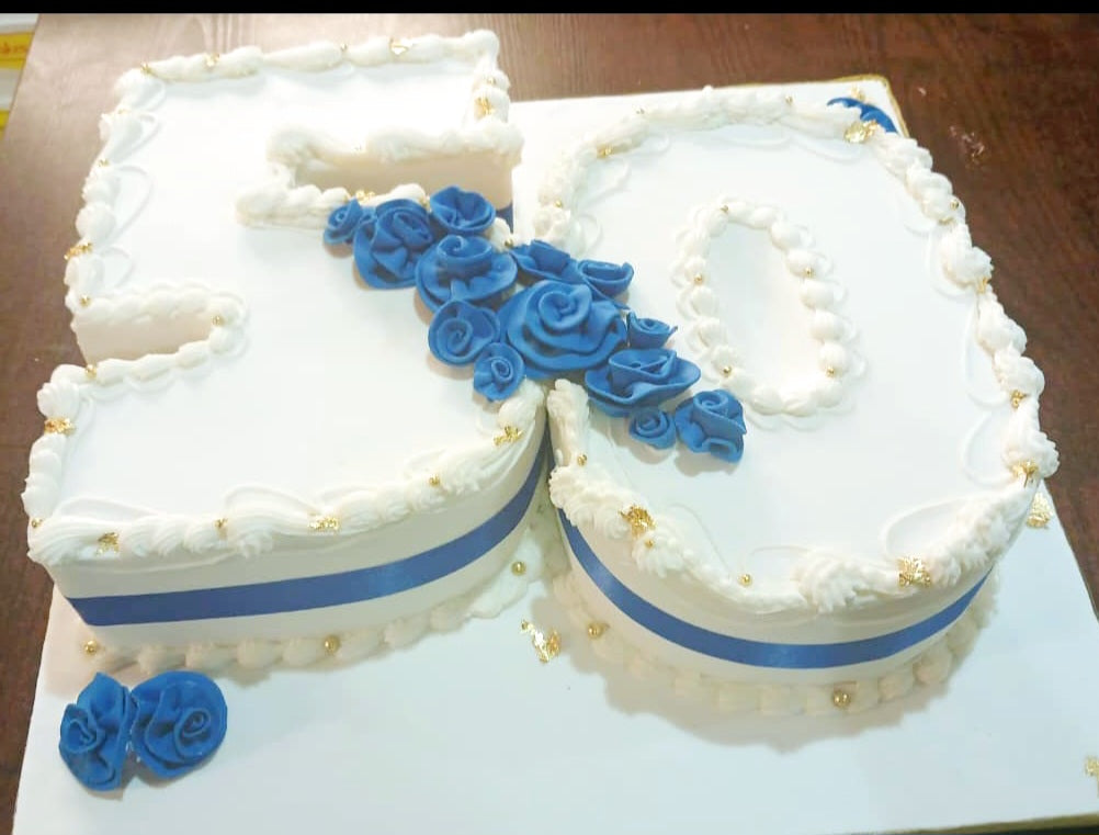 Fondant Figure 50 with satin roses